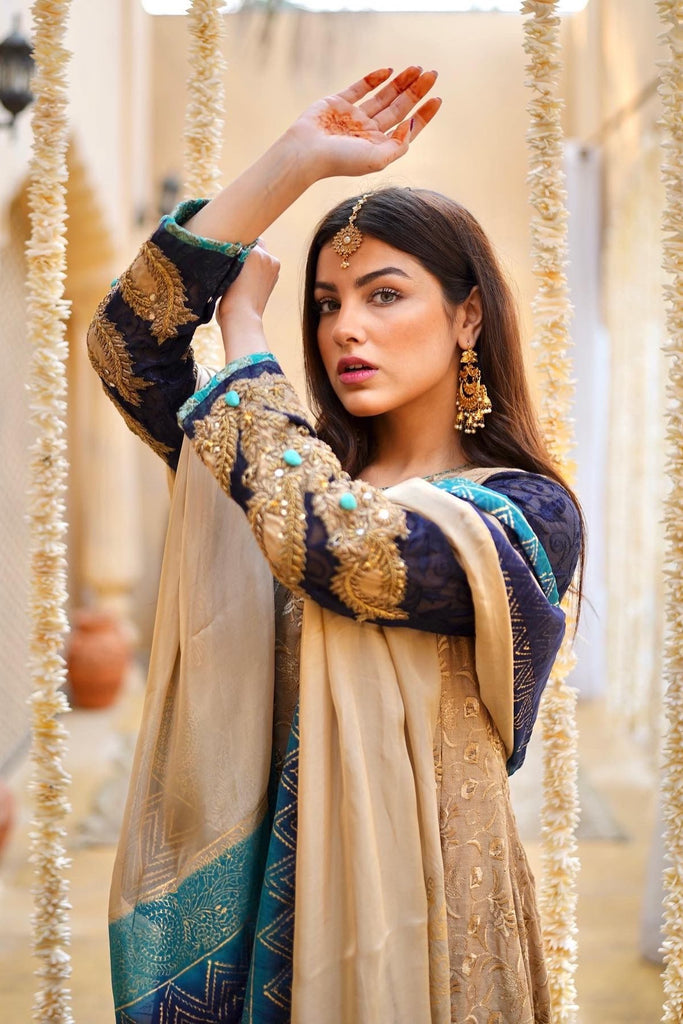 The Beige Angrakha: A Blend of Traditional Elegance and Designer Sophistication