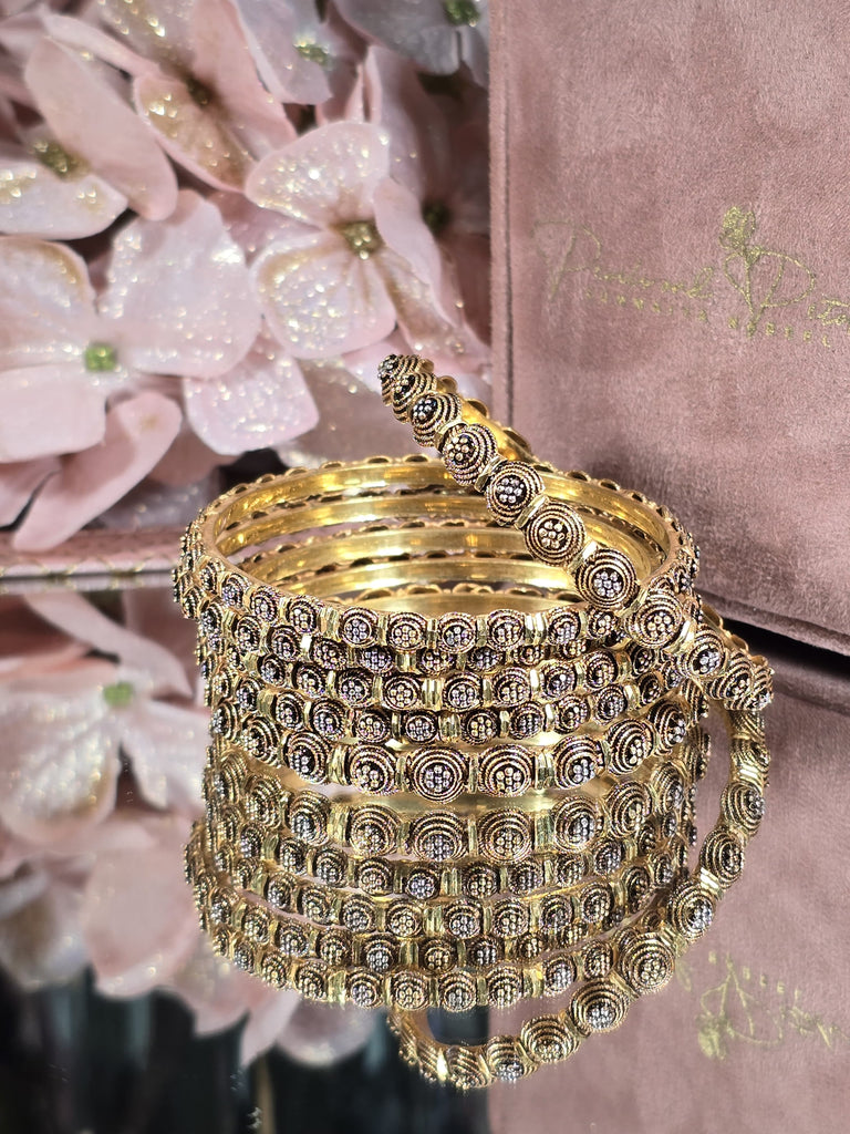 Traditional Accessories in Style: The Beauty of Gold-Plated Bangles