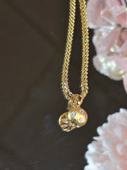 Gold and Zircon Round Pendant